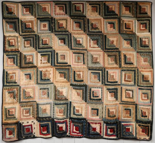 AN ANTIQUE LOG CABIN PATTERN QUILTSeventy-two