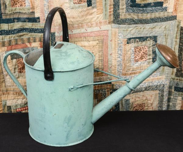 AN ANTIQUE TWO GALLON WATERING