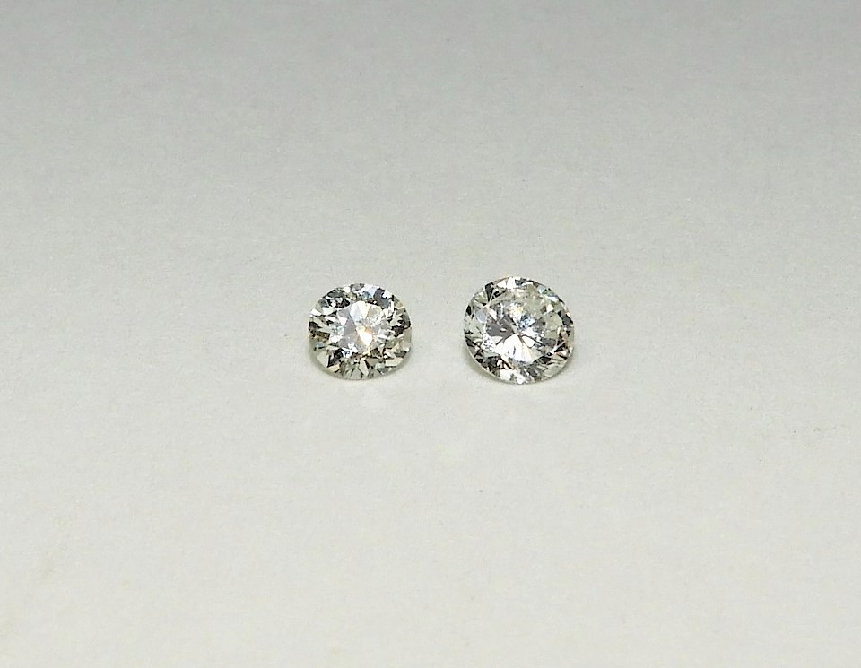 2 VERY FINE APPROX .25CT DIAMONDS ,Two
