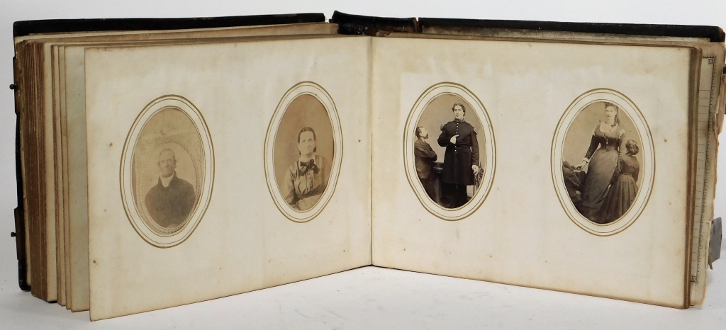 PHOTO ALBUM WITH TINTYPE AND PAPER