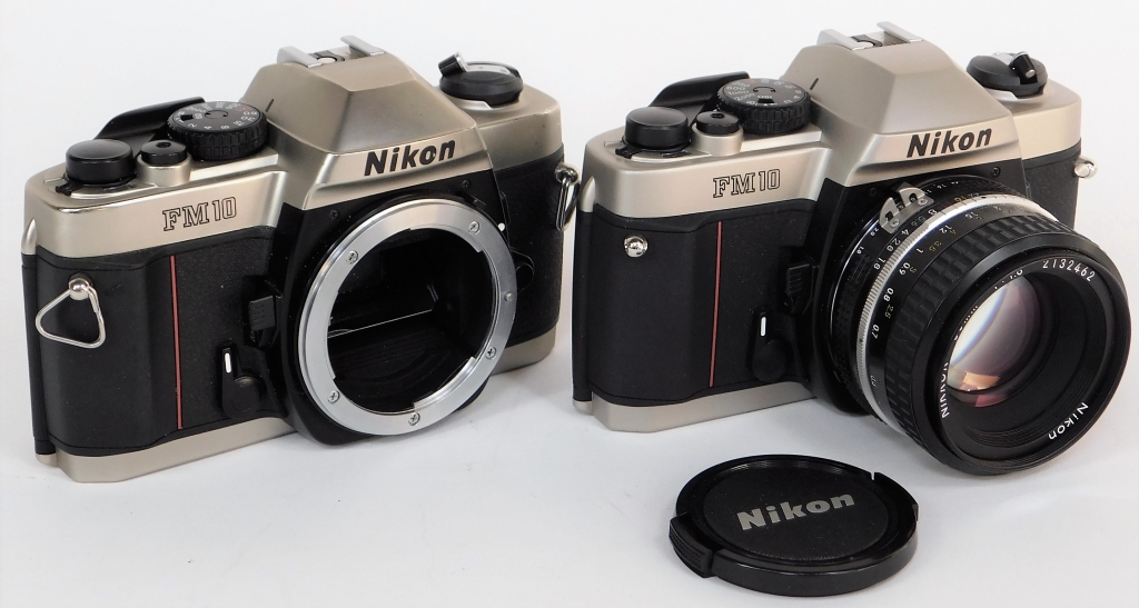 2 NIKON FM10 SLR CAMERA BODIES 29b009