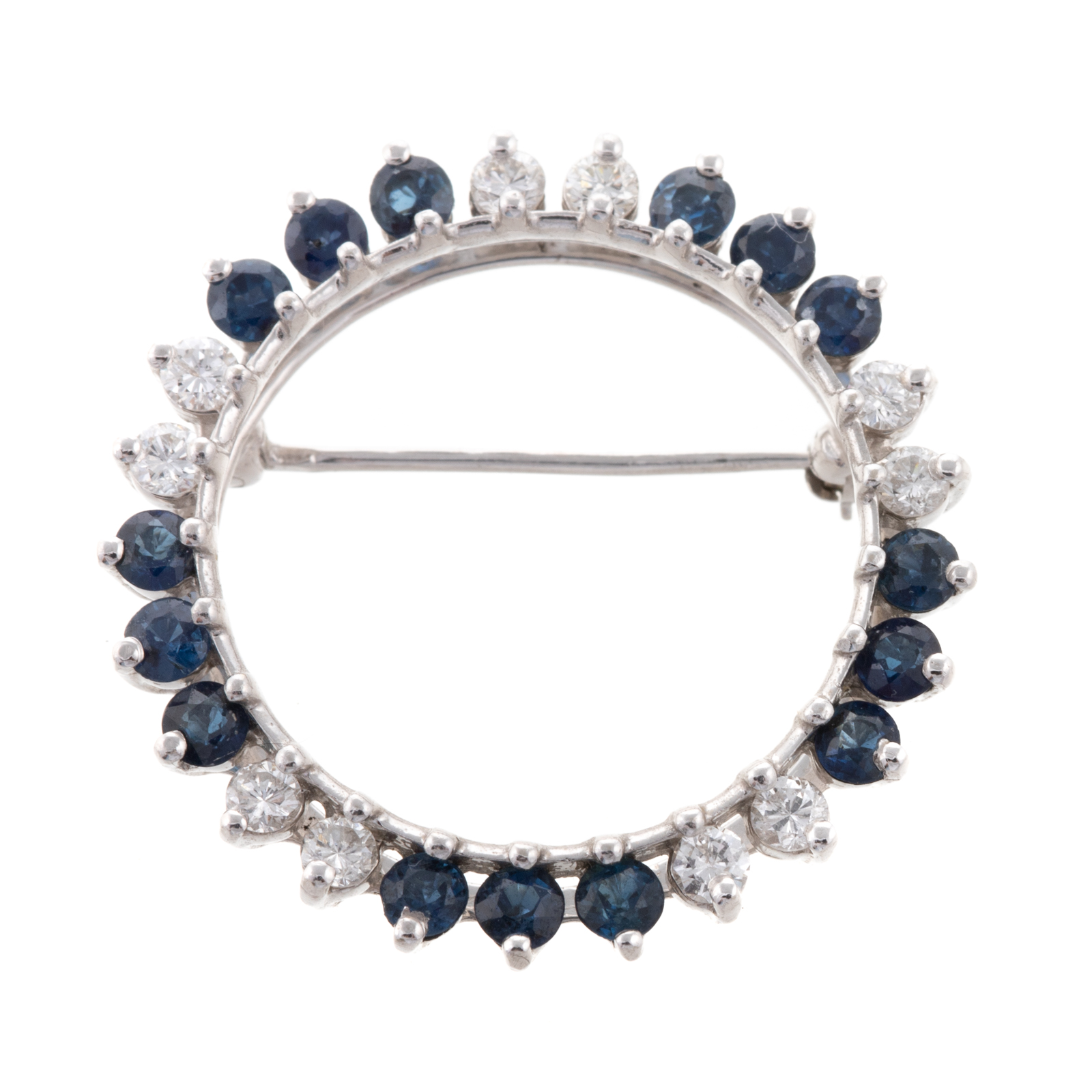 A 14K CIRCLE BROOCH WITH DIAMONDS