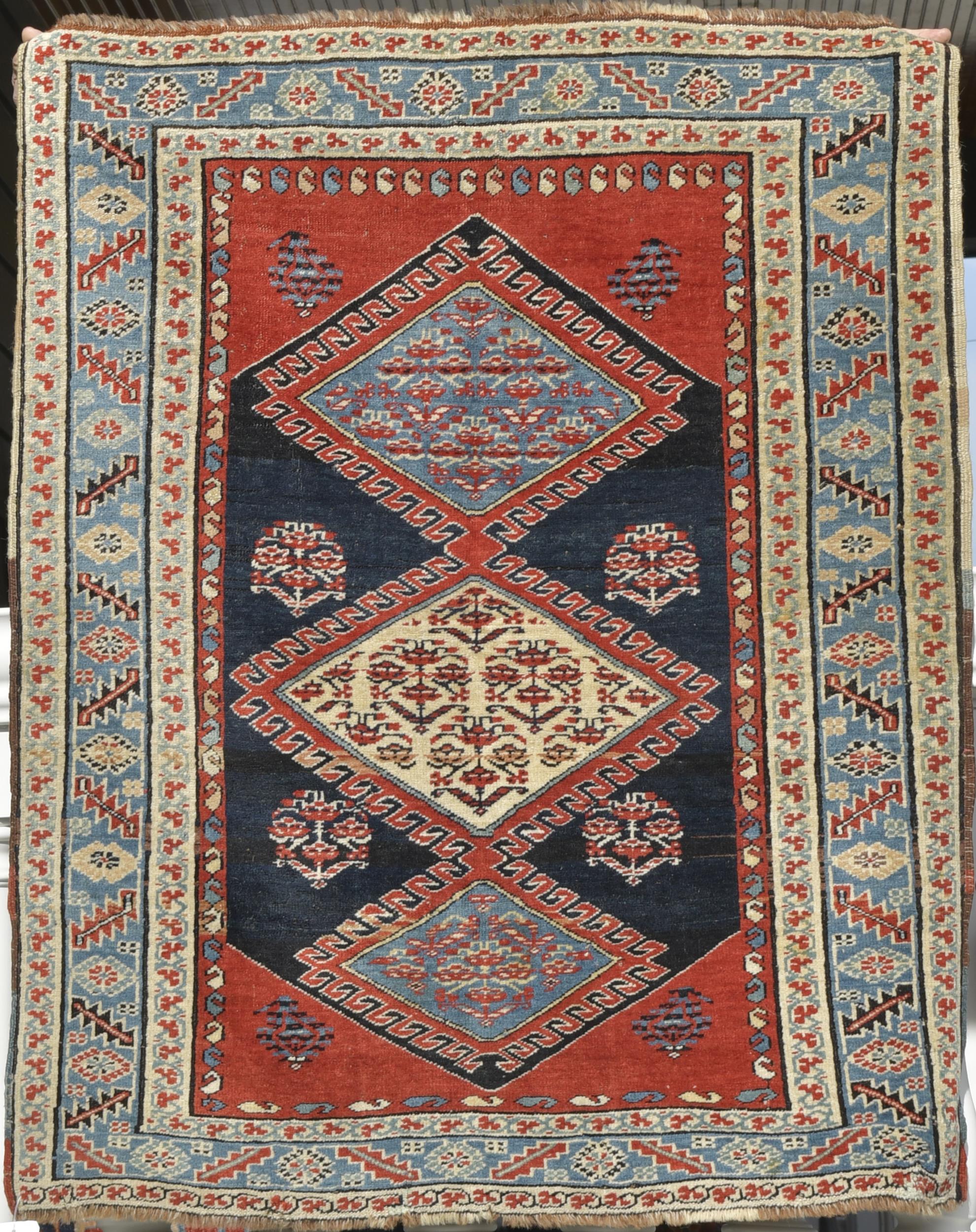 ANTIQUE ORIENTAL SCATTER RUG. A