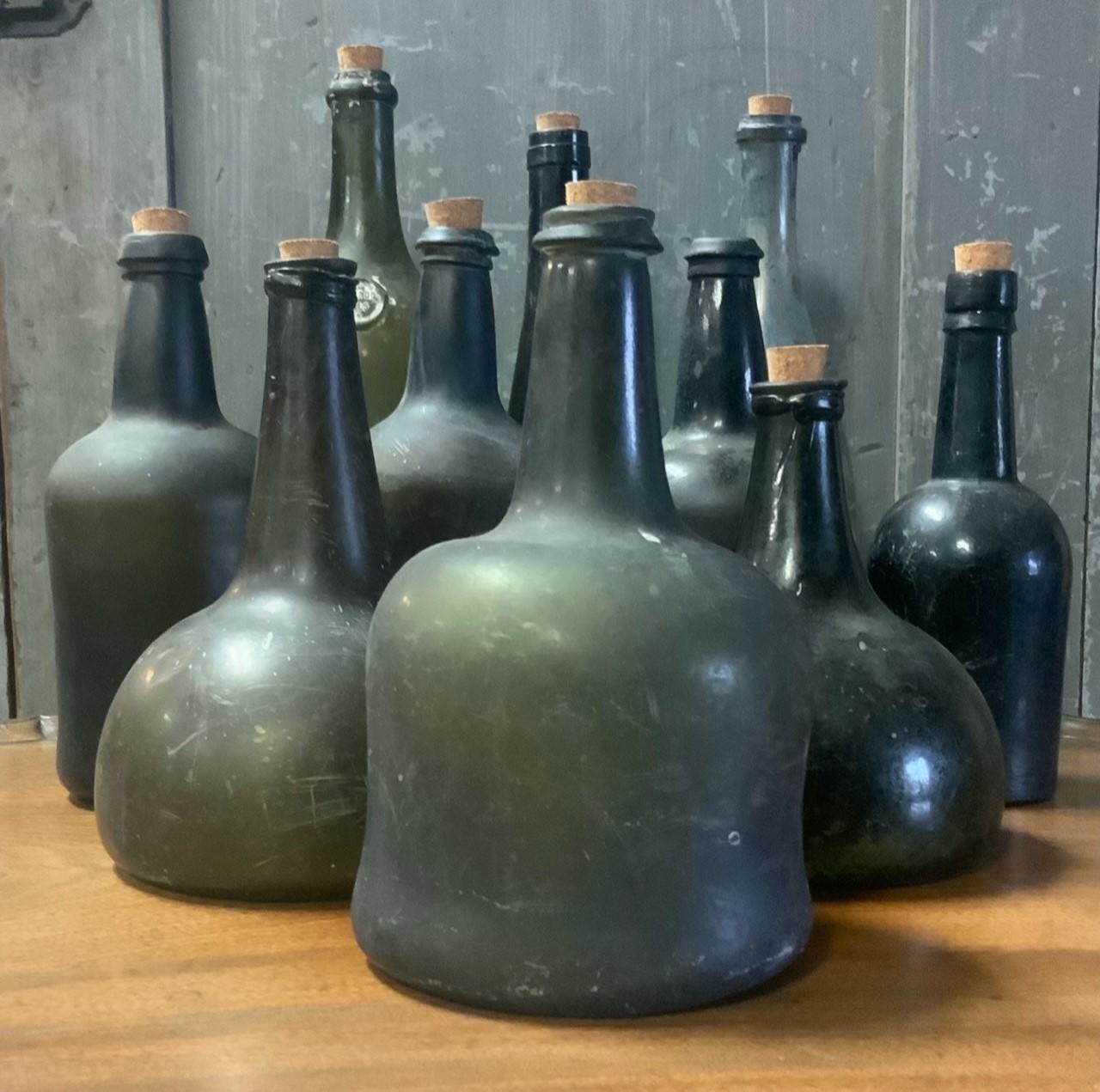 18TH/19TH C. GLASS BOTTLES. Two early