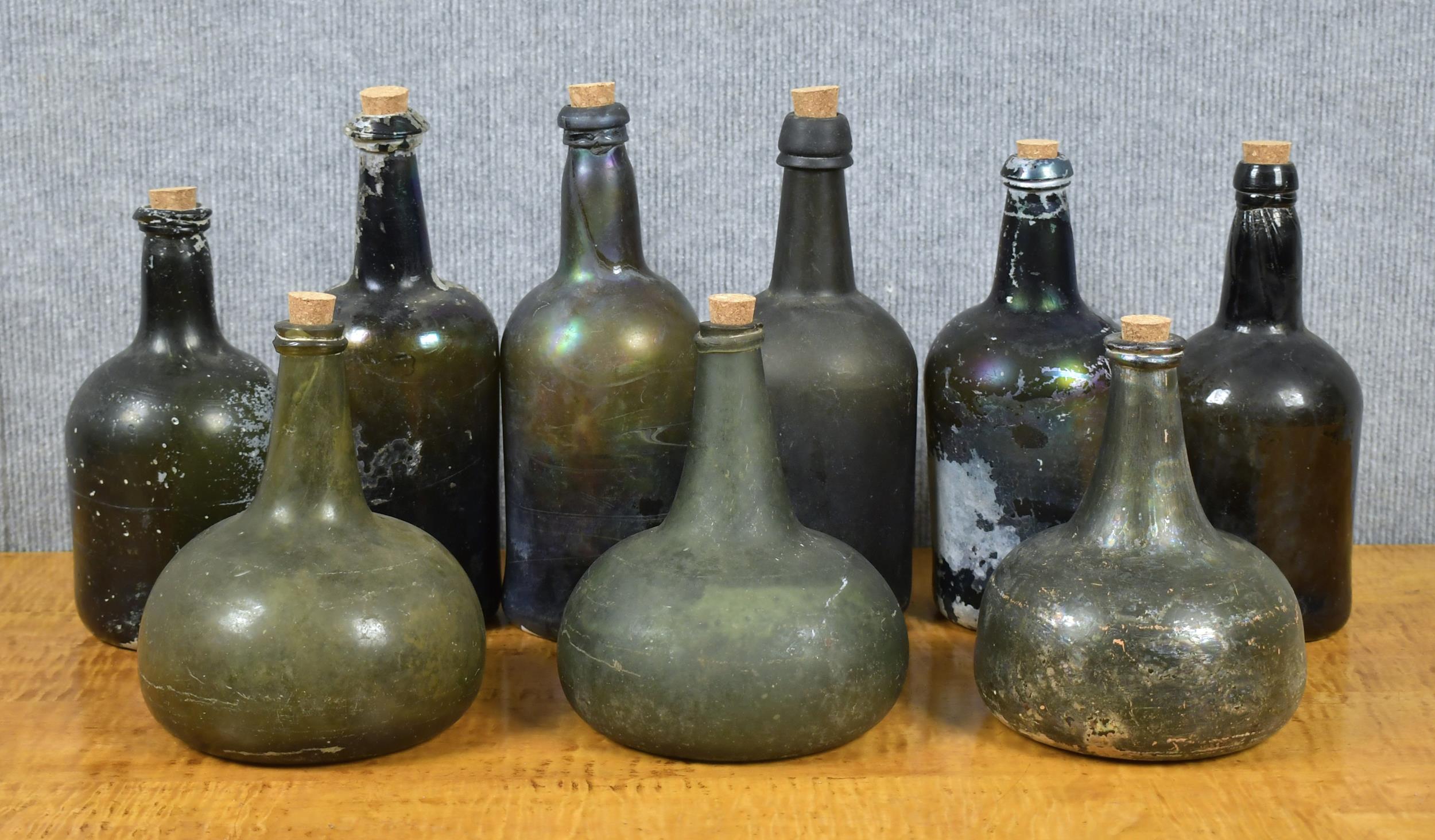 EARLY GLASS BOTTLES. Including,