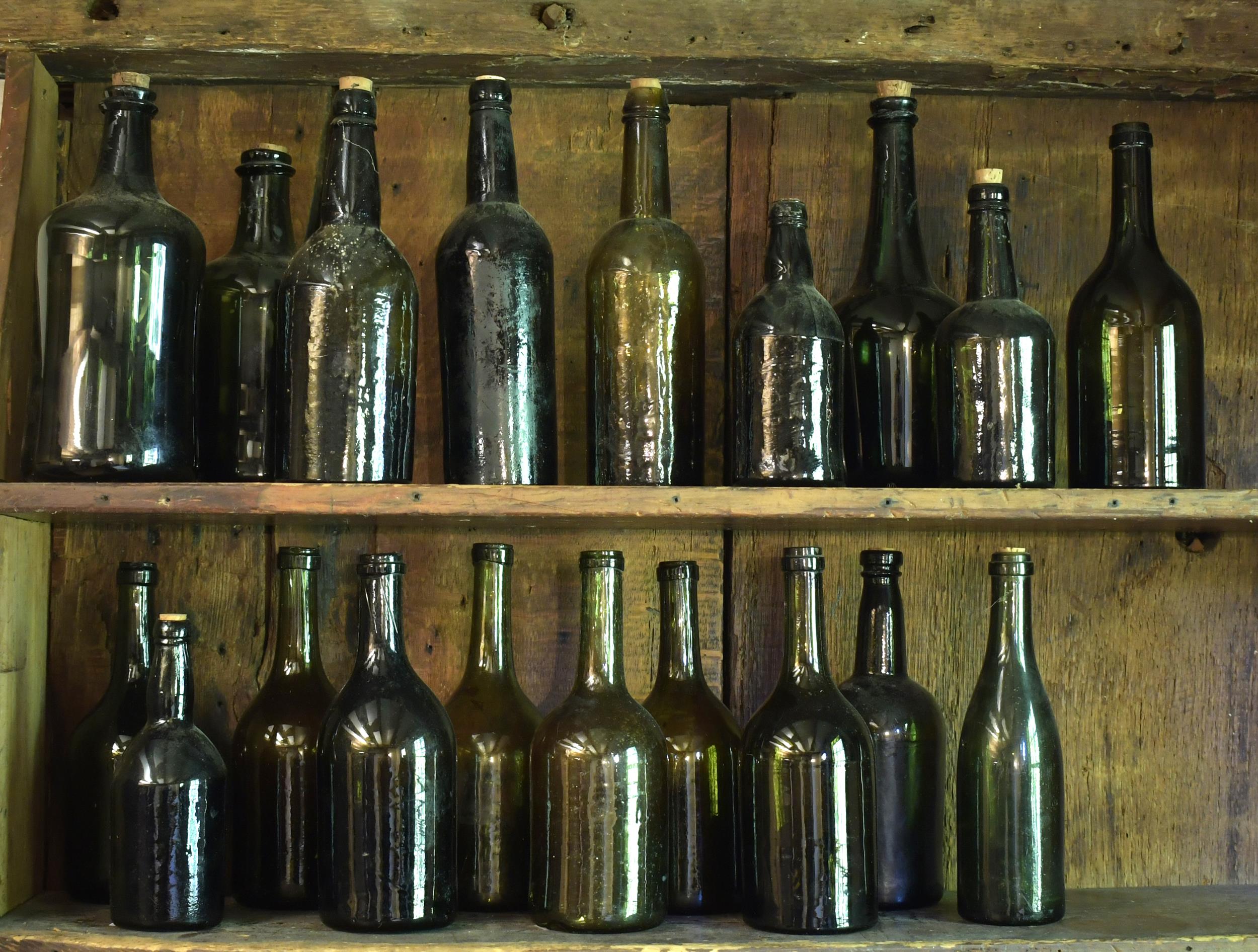 TWENTY EARLY GLASS BOTTLES. 18th and