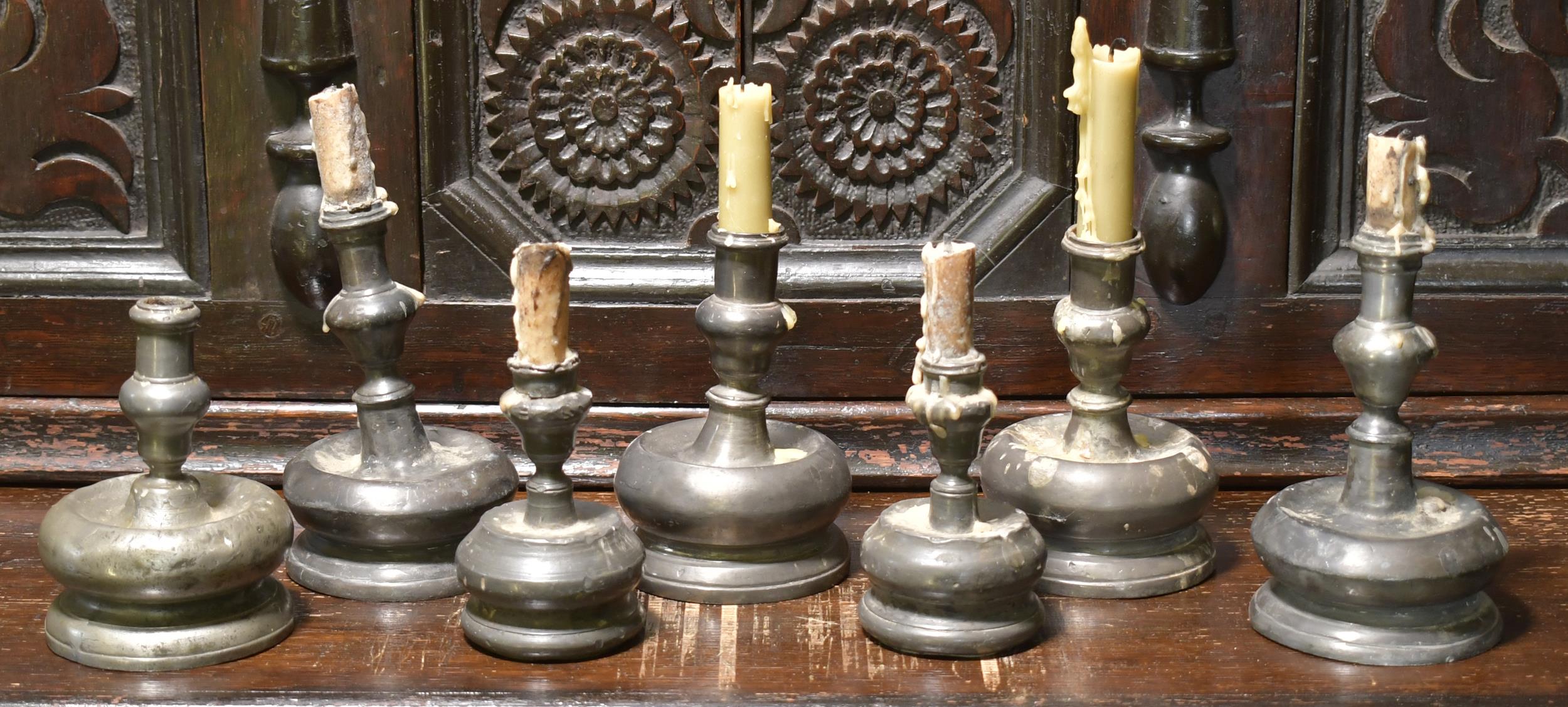 GROUP OF SMALL 17TH C. PEWTER CANDLESTICKS.