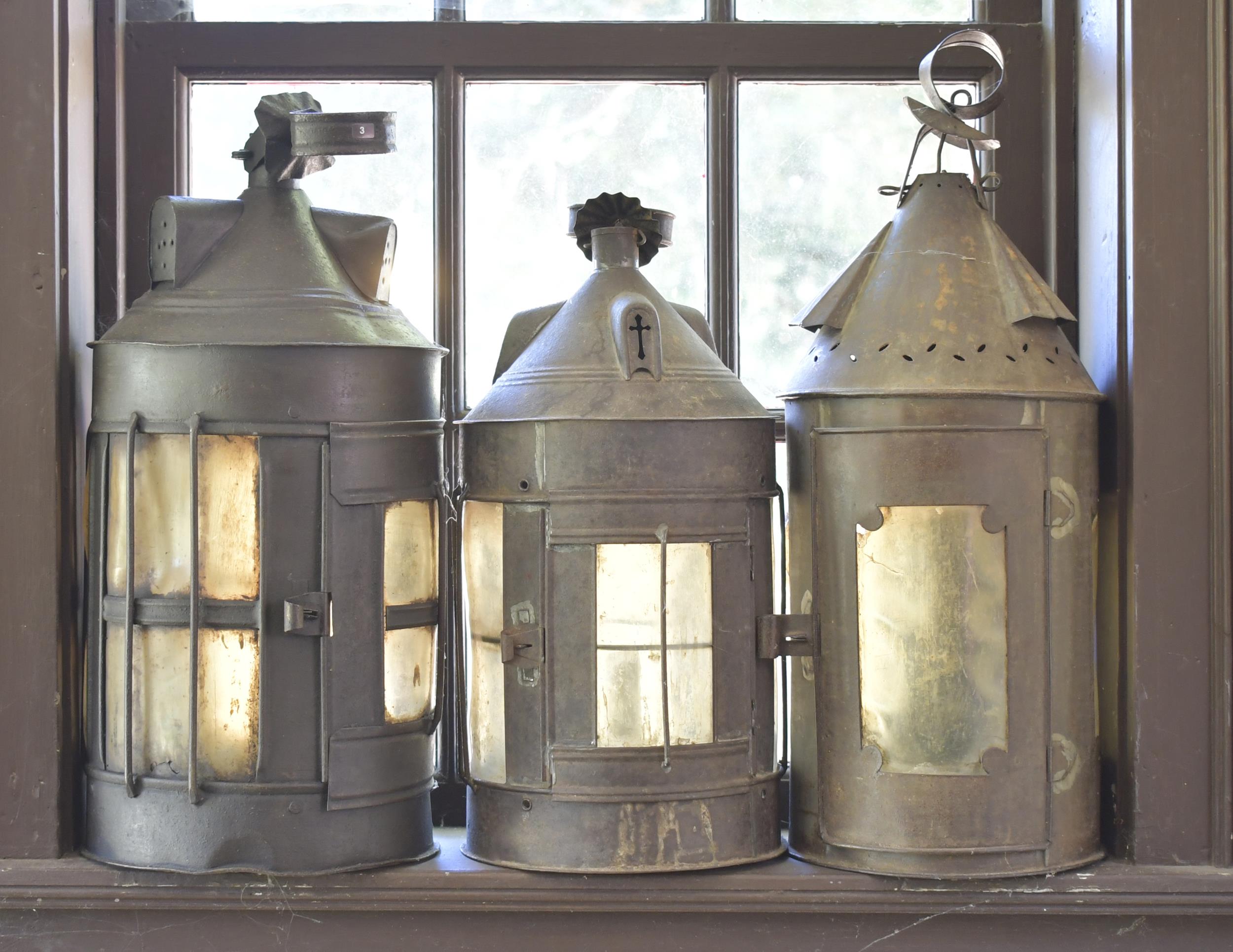 THREE EARLY TIN LANTERNS. Three