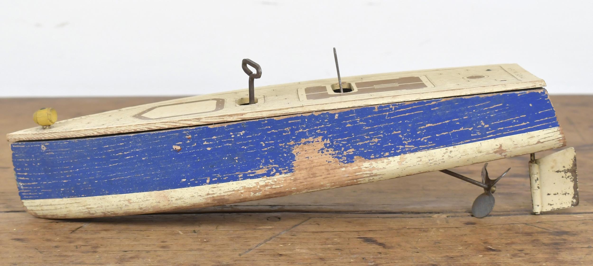 KEYSTONE TOY BOAT. Painted wooden wind-up