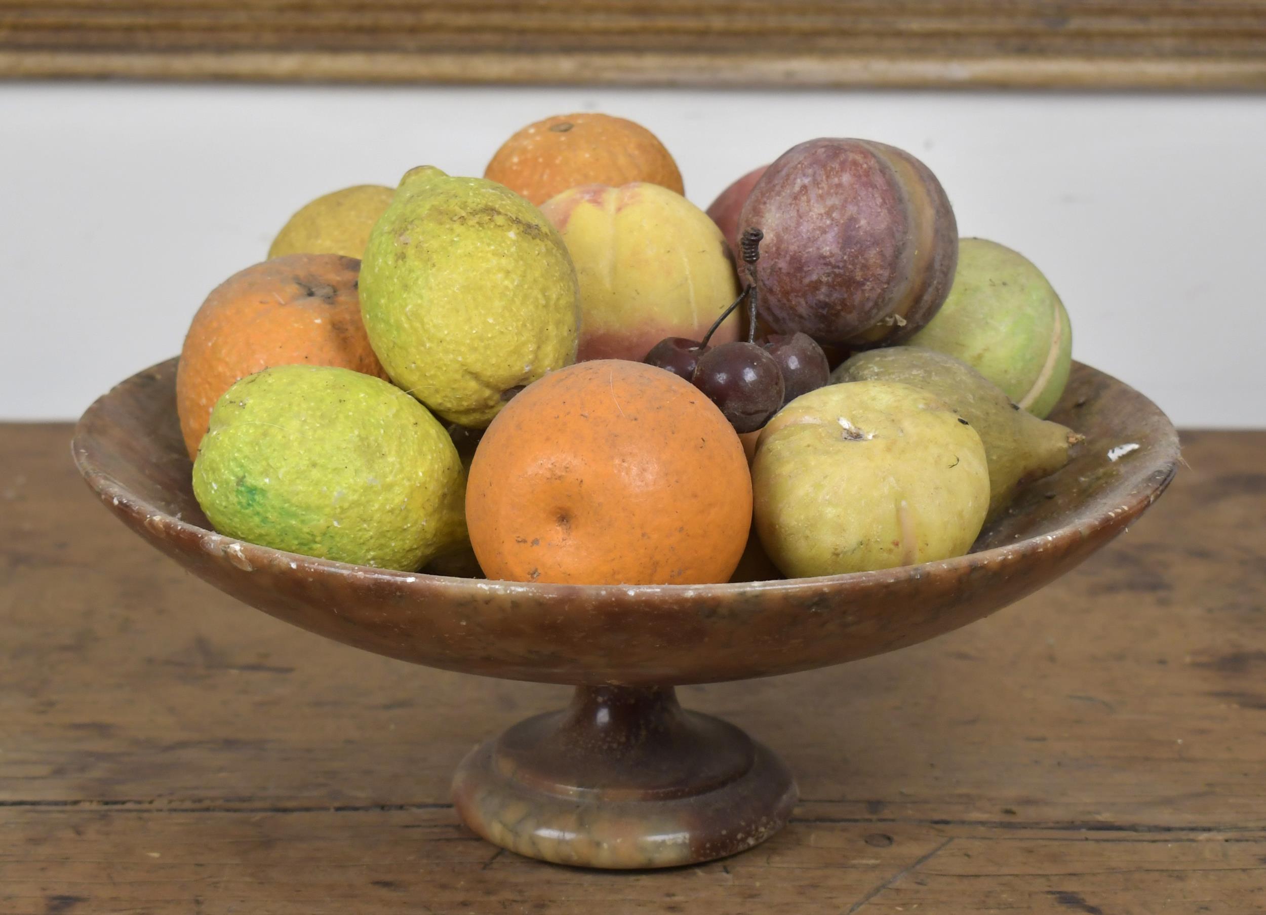 ALABASTER BOWL WITH ASSORTED STONE FRUIT.