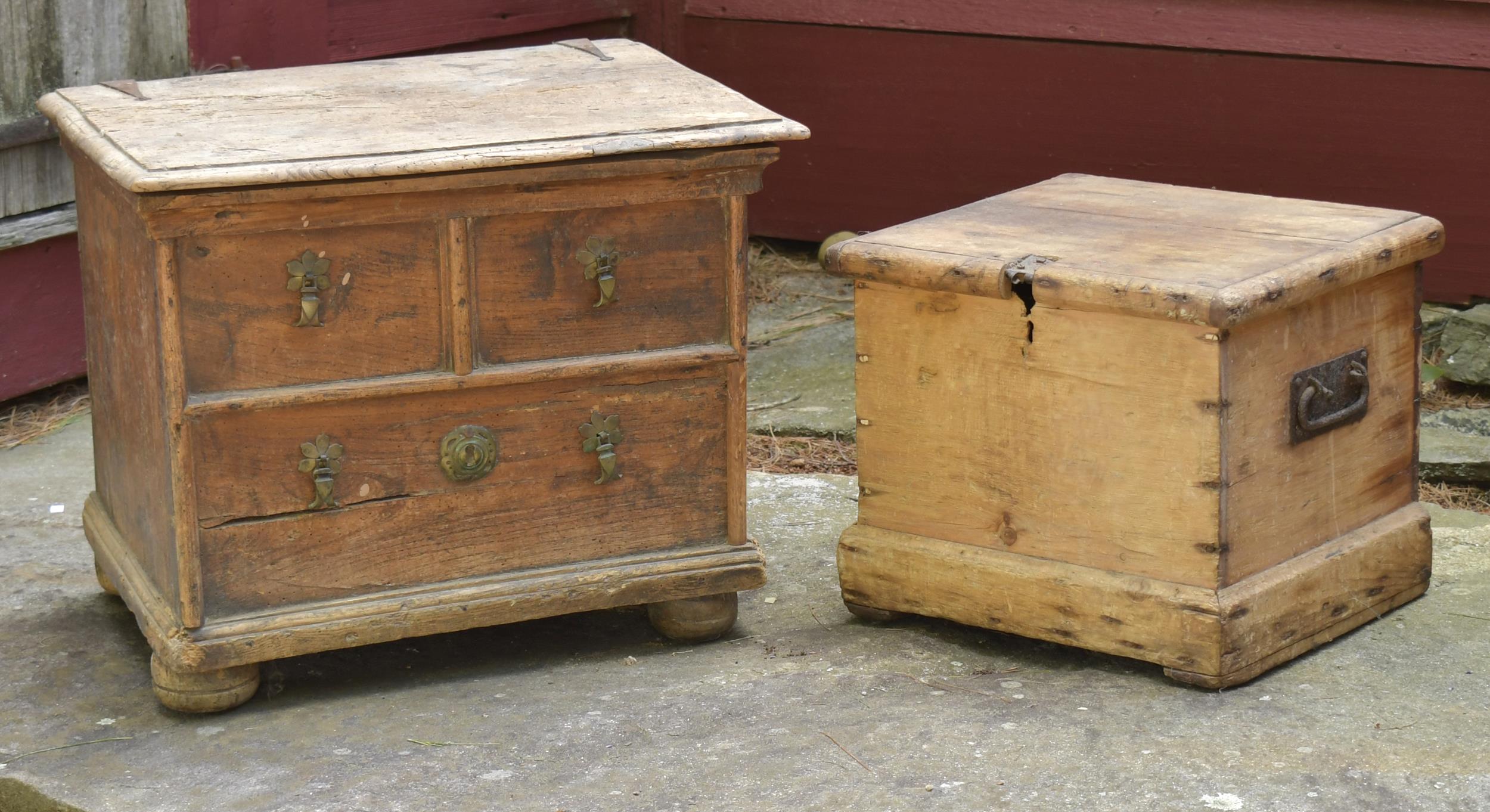 TWO SMALL ANTIQUE LIFT TOP TRUNKS.