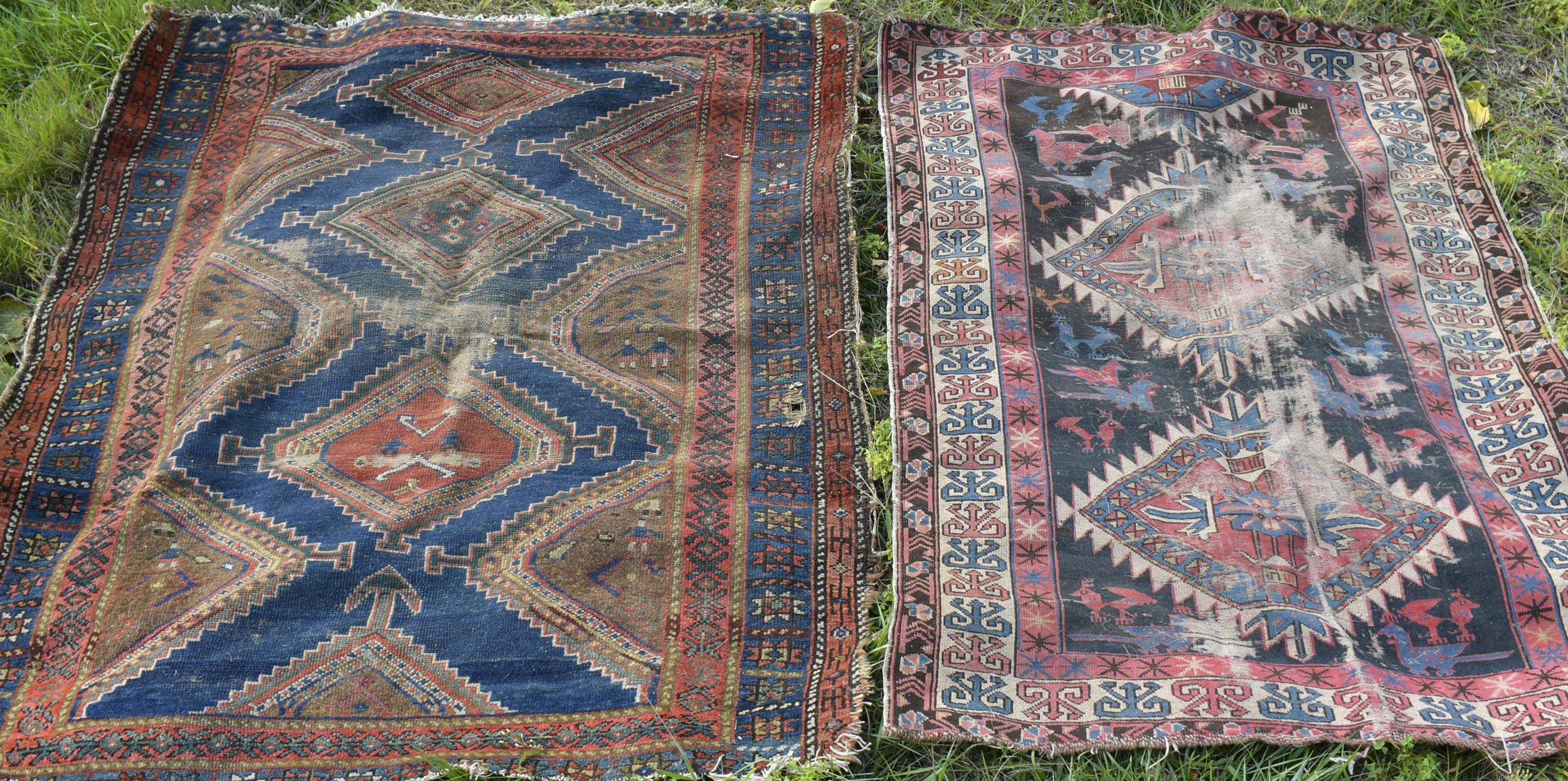 TWO WORN ANTIQUE SCATTER RUGS.
