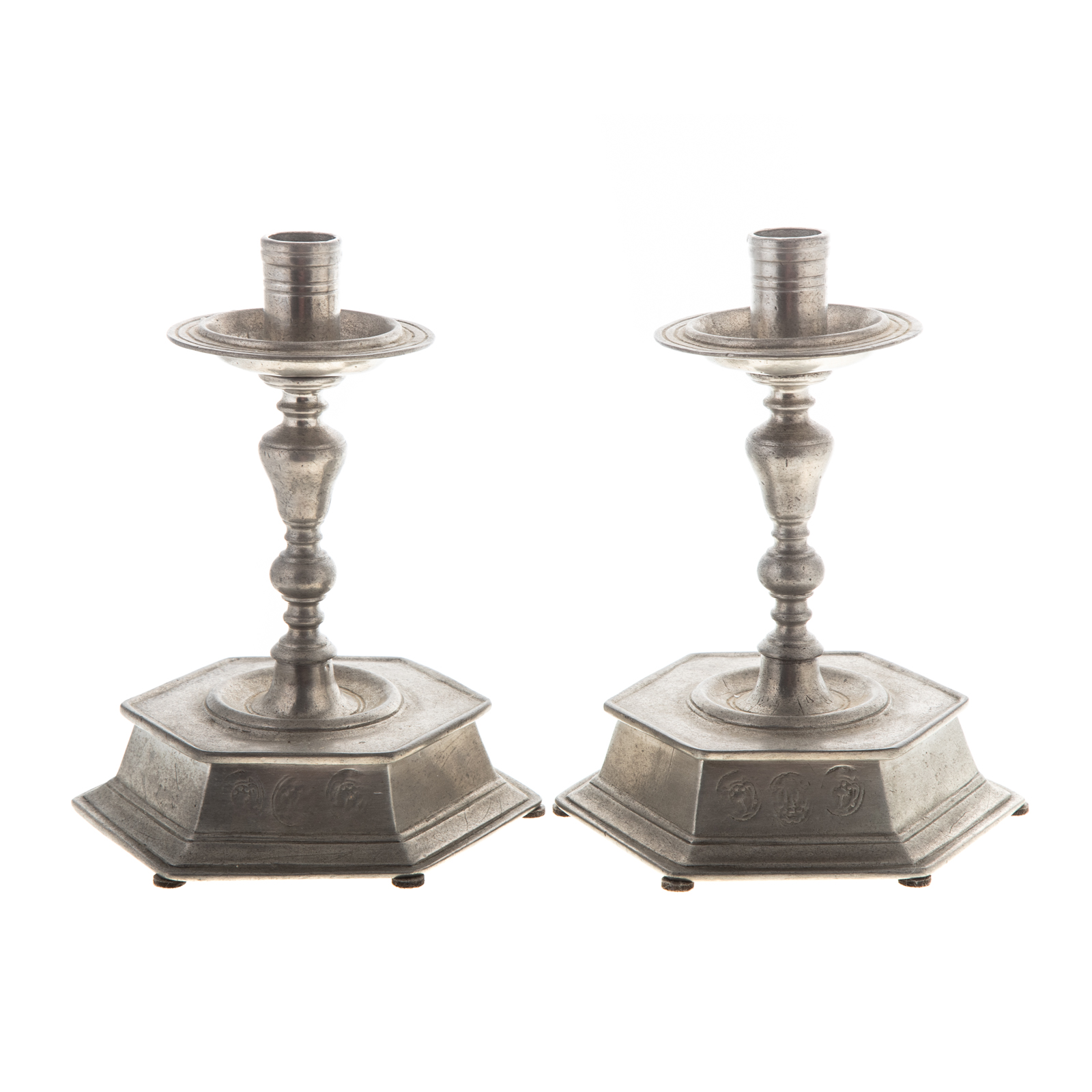 A PAIR OF CONTINENTAL PEWTER CANDLESTICKS