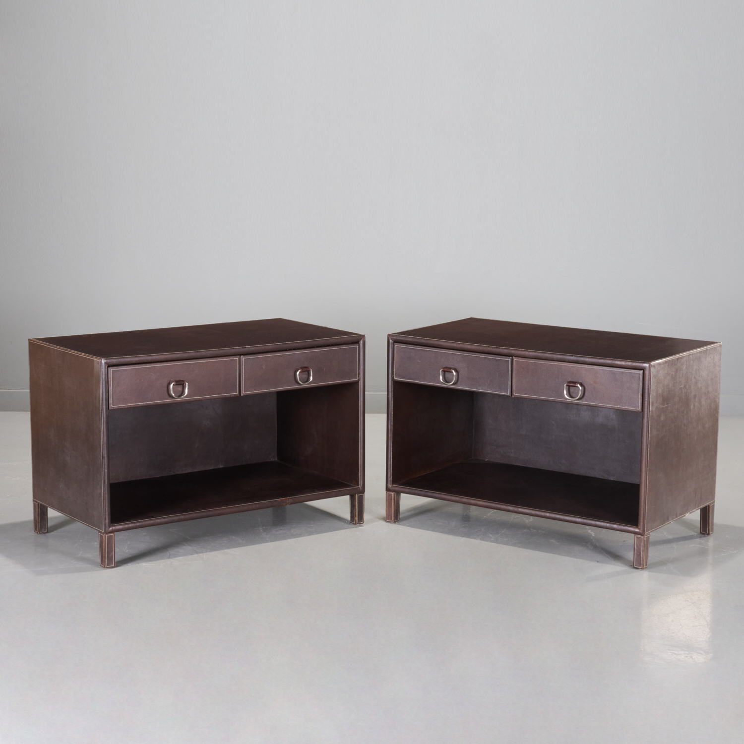 PAIR LEATHER WRAPPED BEDSIDE TABLES  29d282