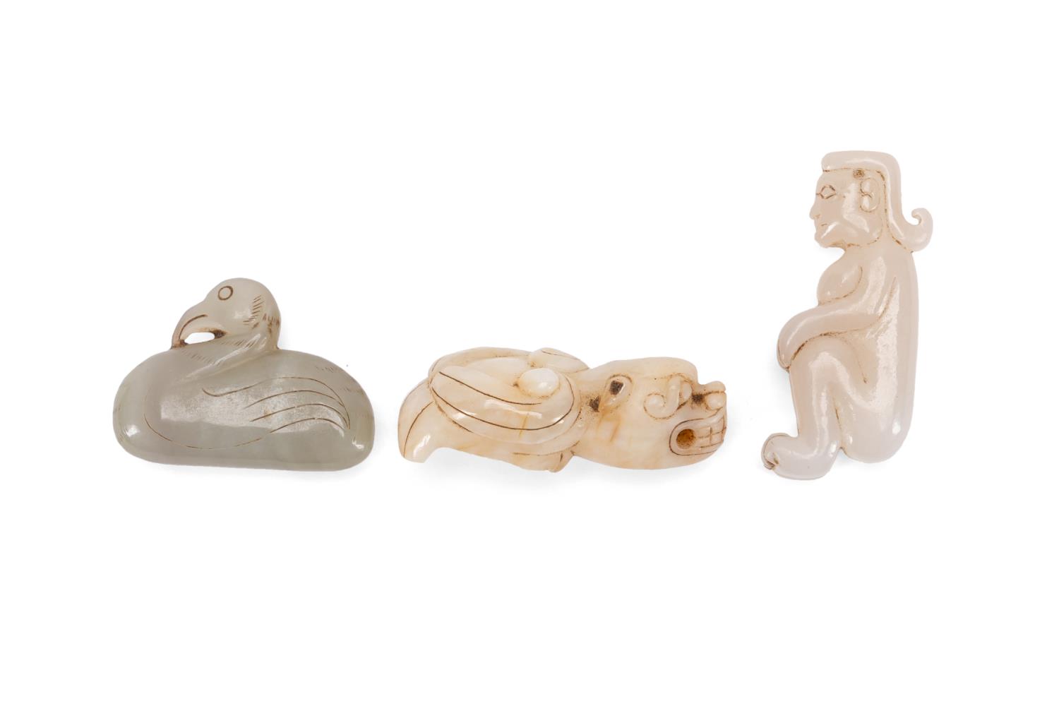 THREE CHINESE CARVED JADE PIECES 29f818