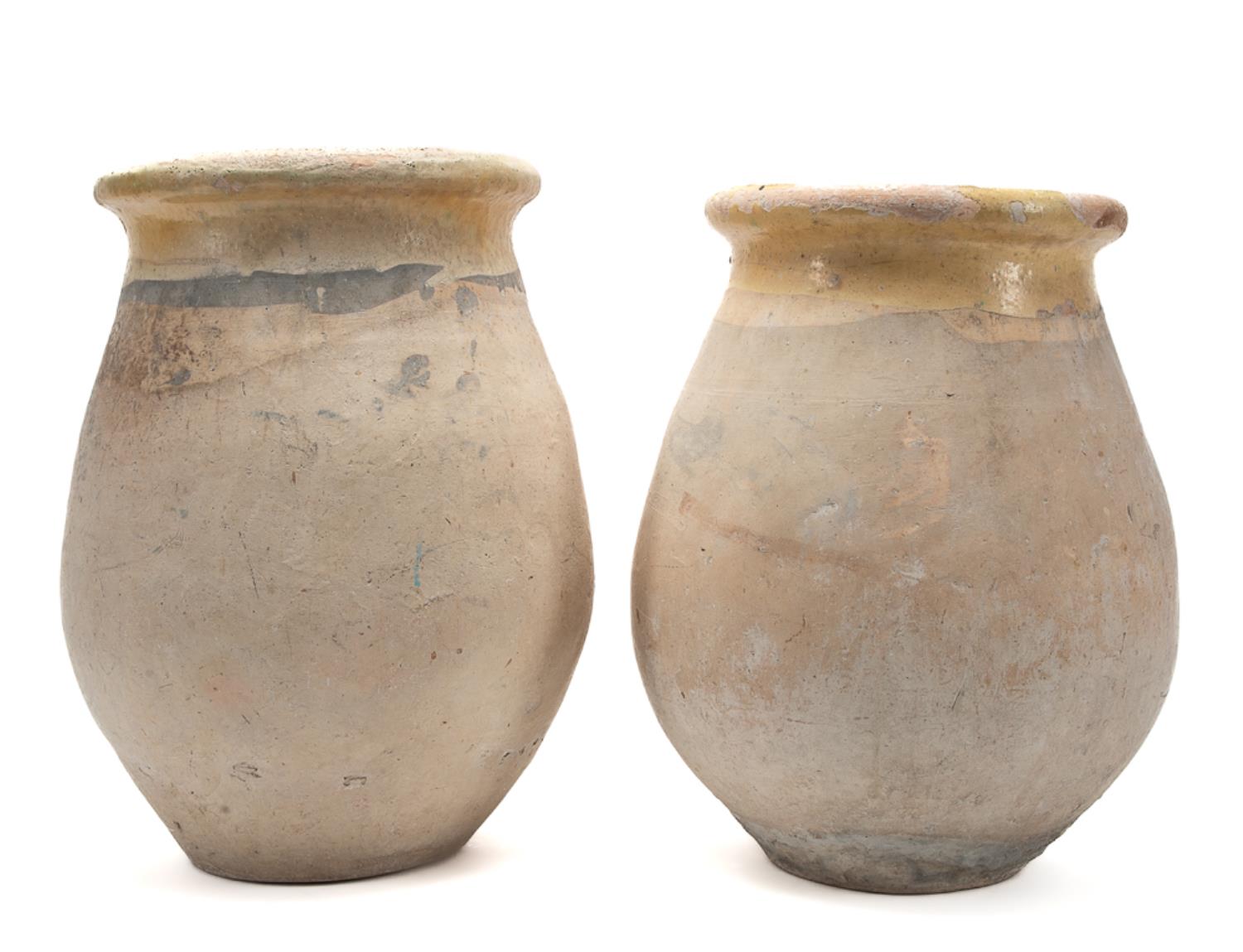 PAIR, YELLOW PARTIAL GLAZED EARTHENWARE