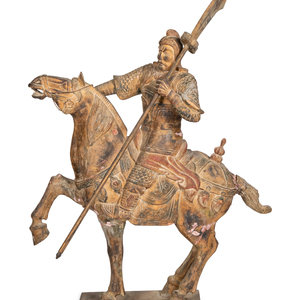 A Carved Chinese Warrior on Horseback
20th