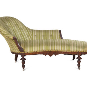 A Victorian Walnut Chaise Longue
Late