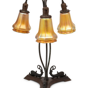 A Cast Metal Three-Light Lamp with