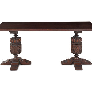 A Jacobean Style Carved Oak Console