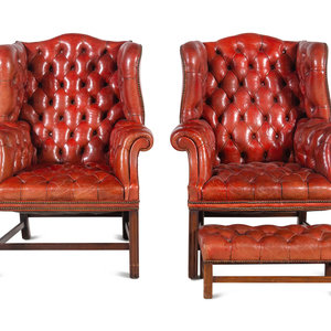 A Pair of Leather Wingback Armchairs