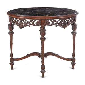 An Italian Carved Walnut Marble-Top