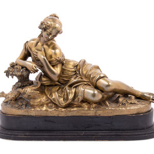 A Gilt Bronze Figure of a Reclining