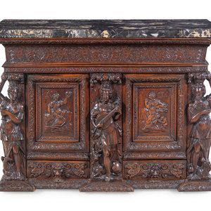 A Renaissance Revival Carved Walnut