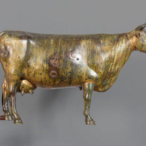 A Molded and Parcel Gilt Copper
