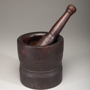 A Lignum Vitae Mortar and Pestle Likely 2a2bcb