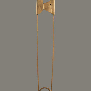 A Gold Painted Bronze Safety Pin
