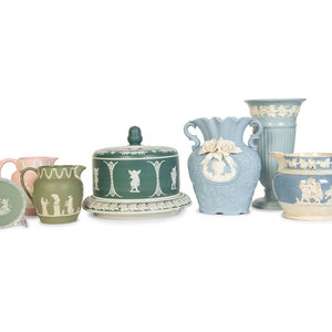 Seven Jasperware Pitchers and Table