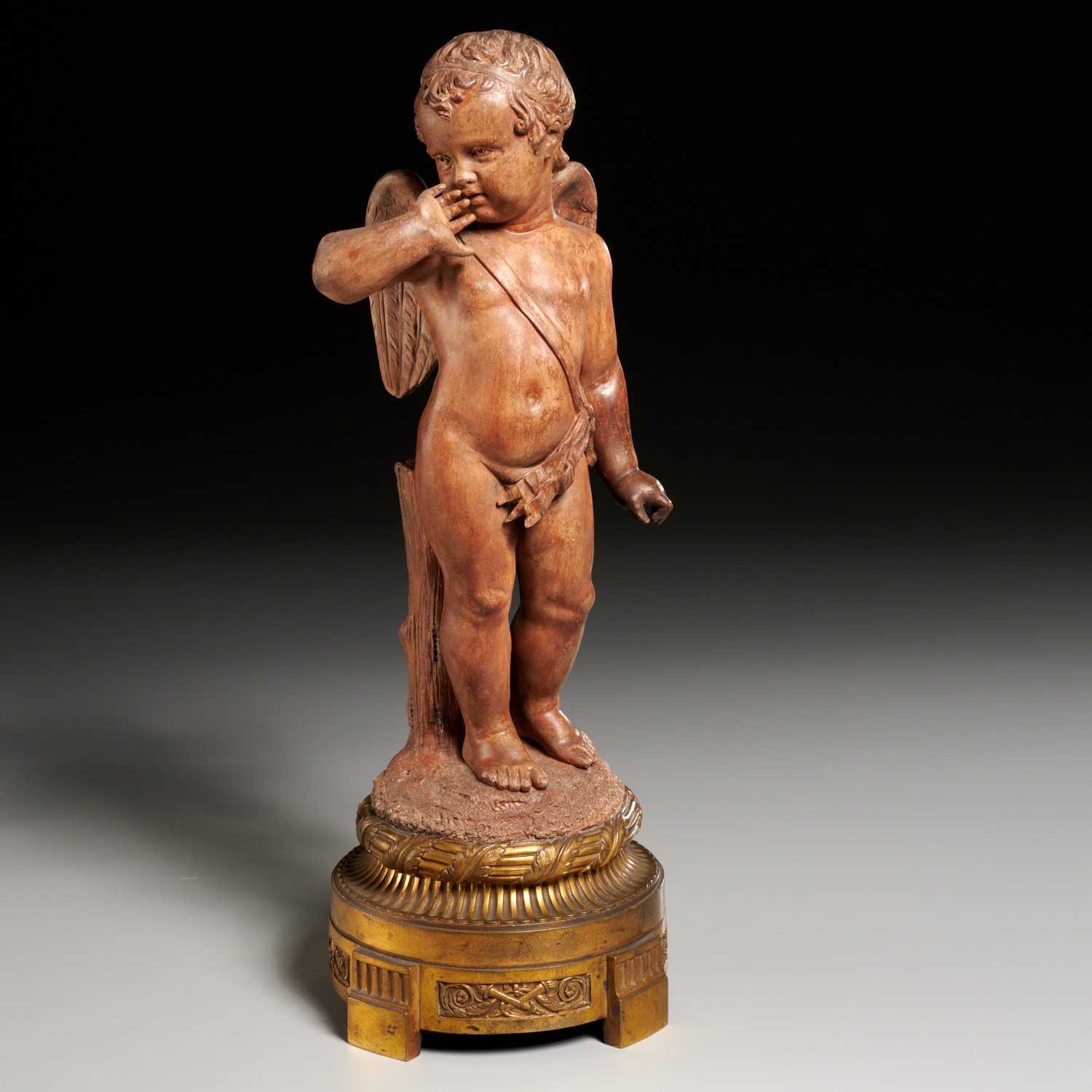 FRENCH TERRACOTTA FIGURE OF CUPID