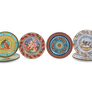 Eight Versace Porcelain Christmas Chargers
Manufactured