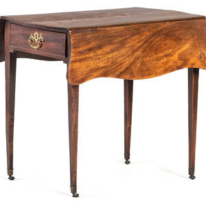 An English Mahogany Drop Leaf Table
Late