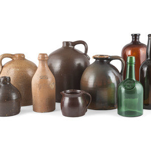 A Group of Stoneware Jugs and Glass