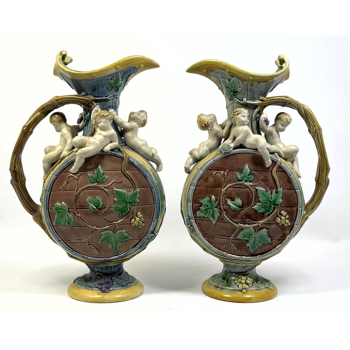 Pair MINTON Majolica Harvest ewers.