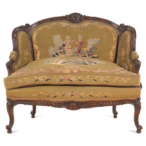 A Louis XV Style Carved Walnut