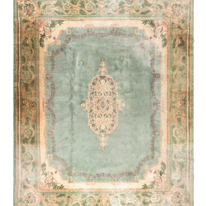 An Aubusson Style Wool Rug
Late