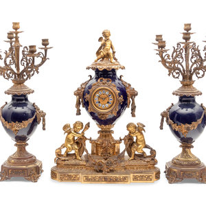 A French Gilt Bronze and Porcelain