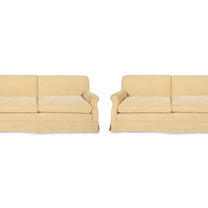 A Pair of Ivory Upholstered Three