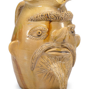 A Contemporary Face Jug
20th Century
incised
