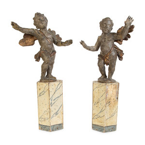 A Pair of Italian Carved Putti