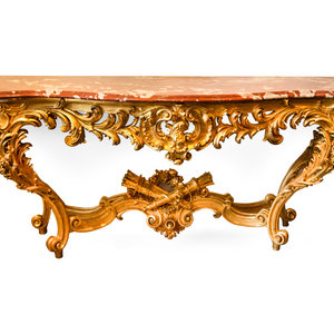 A Louis XIV Carved Giltwood Rouge