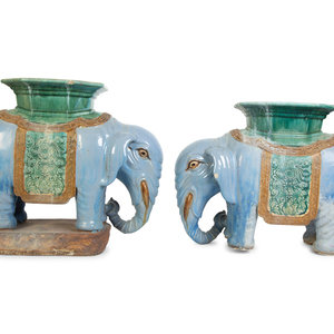 A Near Pair of Chinese Ceramic Elephant-Form