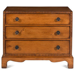 A Contemporary Carved Walnut Chest