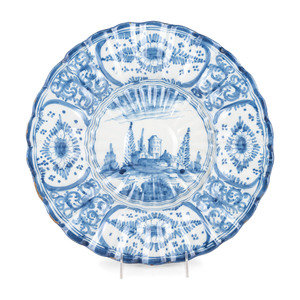 A Delft Style Blue and White Glazed 2a802b