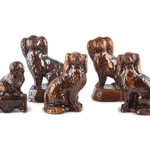 Five Rockingham Glaze Spaniel Figures
19th