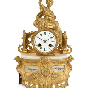 A French Gilt Metal and Alabaster