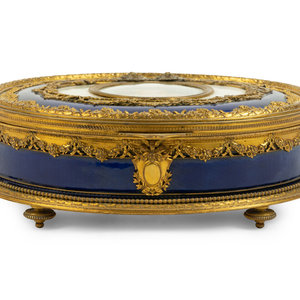 A French Gilt Metal and Enamel